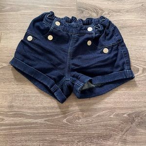 Dark blue girls shorts with silver buttons